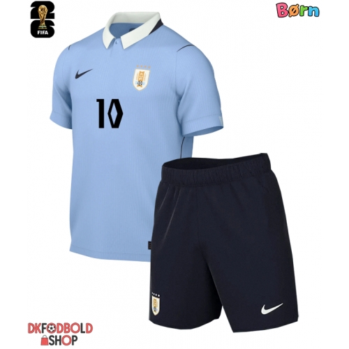 Uruguay Giorgian de Arrascaeta #10 Hjemmebanesæt Børn VM 2026 Kort ærmer (+ korte bukser)